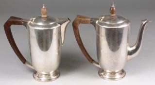 A George V silver coffee pot and hot water jug, maker Major Roswell, London 1933, with hardwood
