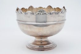 An Edwardian silver punch bowl, maker James Dixon & Son, Sheffield, 1909, of plain circular form,