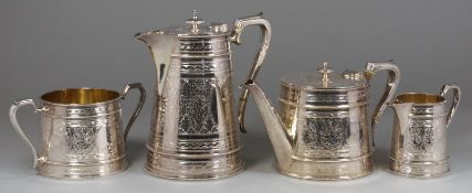 A Victorian four piece plated tea service, of tapered circular form, engraved with foliate motifs,