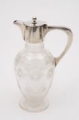 A George V clear glass and silver mounted claret jug maker J.R, Sheffield, 1912 of globular ovoid