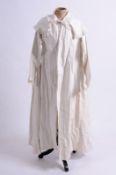 An early 19th century lady’s nightshirt with double frilled collar and single frilled cuffs,