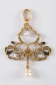 Giuliano. A late 19th century enamelled gold, garnet and seed-pearl pendant: of openwork foliate