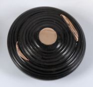 A 19th century circular tortoiseshell and gold mounted snuff box, of ribbed form, 5.25cm. diameter