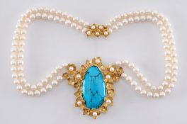 A turquoise, diamond and cultured pearl necklace with two strings of cultured pearls suspending a