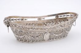 A French silver basket. of oval outline, with embossed bust of a gentleman to the central oval