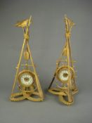 A pair of late 19th Century gilt maritime clocks, by Ansonia, the circular cased movement with