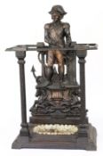 An early 20th Century cast iron Nelson umbrella stand, having cast full length figure of Nelson