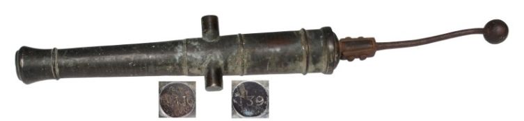 A late 18th/early 19th Century 37 inch bronze bow chaser cannon, the three stage barrel with