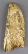 A 19th century scrimshaw decorated tooth, incised with a half dressed Britannia type figure to