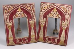 A pair of Persian velvet and metal thread easel frames of rectangular outline, decorated with