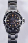 Rolex. A gentleman’s stainless steel ‘Oyster Perpetual Date Submariner 660ft = 200m Superlative