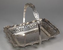 An Edward VII silver swing handled cake basket maker Williams Ltd, Birmingham, 1903, of