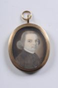 James Jennings [fl.1763-1793] Miniature portrait of a cleric head and shoulders with blue eyes and