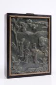 A Chinese spinach jade rectangular panel carved with three elegant ladies standing beneath a