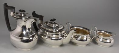A George V four piece silver tea set, maker E. Viners Ltd, Sheffield, 1925, of a rounded oblong form