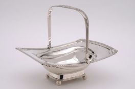 A late Victorian silver swing handled basket, maker William Hutton & Sons Ltd, London, 1900, of