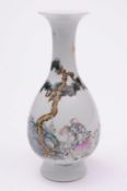 A Chinese porcelain vase of slender oviform with raised and flaring neck enamelled in the famille