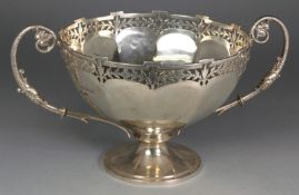 A George V silver two handled pedestal bowl maker Stewart Dawson & Co London, 1913, with pierced