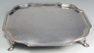A George V silver salver, maker HE Ltd, Sheffield, 1927, of shaped square outline with moulded