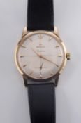Omega. A gentleman’s 9ct gold wristwatch the signed satin finish circular dial, 30mm diameter with