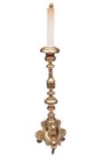 A 19th century brass pricket floor candlestick in the Italian style with foliate decorated knopped