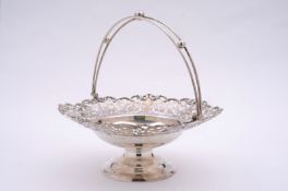 A George V silver circular cake basket maker B.R & S Sheffield, 1920, with swing handle, and pierced