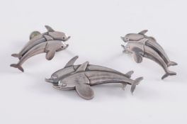 Georg Jensen. A double dolphin brooch stamped ‘317’ with matching earrings stamped ‘129 Georg Jensen