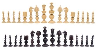 A 19th century Indian Vizagapatam ivory chess set one side stained dark brown, the other side left
