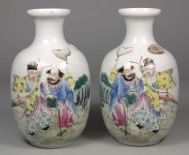 A pair of Chinese porcelain ovoid vases decorated in famille rose enamels with two bearded men
