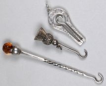 Three silver button hooks various makers and dates.