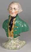 A Staffordshire portrait bust of Charles, Earl Cornwallis wearing a green jacket and embroidered