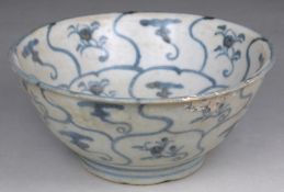Tek Sing Cargo - a Chinese porcelain bowl the interior and exterior painted in blue with lotus bands