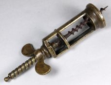 A Farrow & Jackson type brass mechanical corkscrew of single action, unmarked.