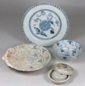 Tek Sing Cargo - four items of Chinese porcelain comprising a circular dish the interior and