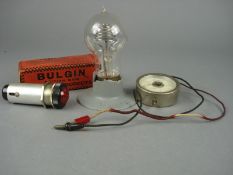 An early 20th Century Mazda Neon bulb, a boxed Bulgin signal lamp and a voltmeter:.