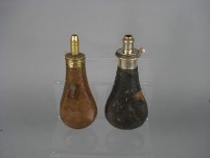 A leather and silver plate mounted powder flask by G & J W Hawksley : and a copper powder flask (2)