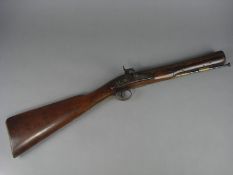 A 19th Century percussion cap blunderbuss by P Bond:, the 12 inch flared barrel with engraved