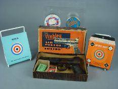 A boxed Webley Junior .177 air pistol and accessories:, to include targets, pellets etc.