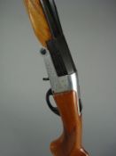 A B.S.A. 12 bore single barrel shotgun: 0121202, vented rib 28 inch barrel,scroll engraved action