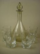 A suite of fly fishing engraved drinking glasses and matching decanter:, each with varied fishing
