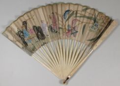 An 18th century  fan the paper leaf decorated in the chinoiserie taste with figures, birds and