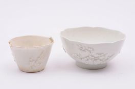 A Bow white slop bowl with shaped rim, applied with prunus sprigs, circa 1755, 12 cm diameter,