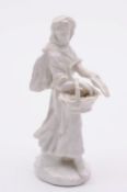 A Bow white figure of a street pretzel seller after the Meissen original by F. Reinicke, the lady