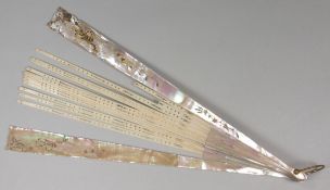 A set of 19th century sticks and guards the mother-of-pearl sticks with ivory extension having