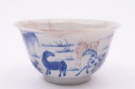 A Chinese underglaze blue and copper-red bowl painted with the Eight Horses of Mu Wang, six charater