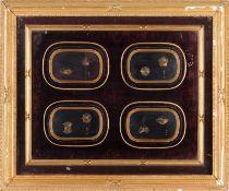 A set of four Japanese black lacquer rectangular panels each with two fan shaped medallions