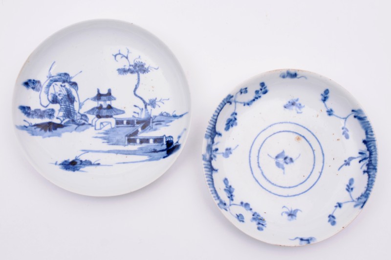 A Longton Hall blue and white saucer painted with the ‘Gate House’ pattern of an oriental