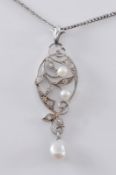 A pearl and diamond pendant of foliate openwork design with single pearl drop and on fine chain.