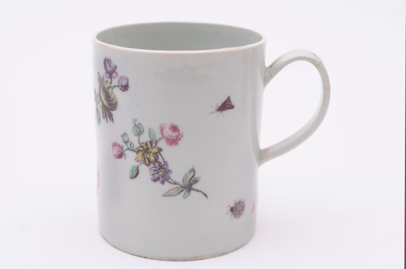 A Vauxhall mug of cylindrical form with grooved loop handle, polychrome printed with insects