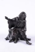 A Japanese bronze seated figure  of a peasant in traditional costume, seated on a tree trunk, his
